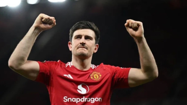 Maguire raised his arms as he stood on the pitch in a leadership stance